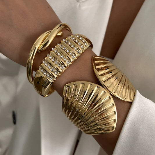 Bracciali Bangle Chunky Maxi Dorati Tendenza Moda 2025